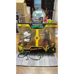 Playmates Toys:  TMNT Donatello VS Cobra Kai Johnny Lawrence